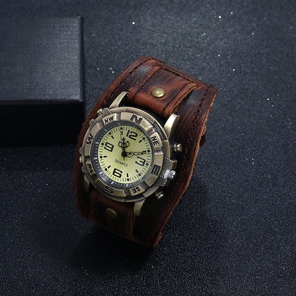 Antique brown steampunk watch three-quarter view showing wide leather strap, bronze metal hardware, and detailed dial with vintage styling