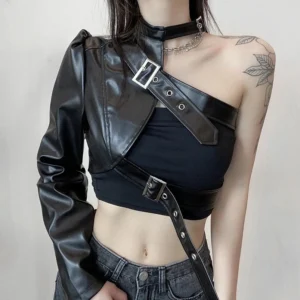 Asymmetrical single-sleeve steampunk cropped leather jacket for women, front-left view showcasing black faux leather construction with metallic buckle straps and industrial hardware details