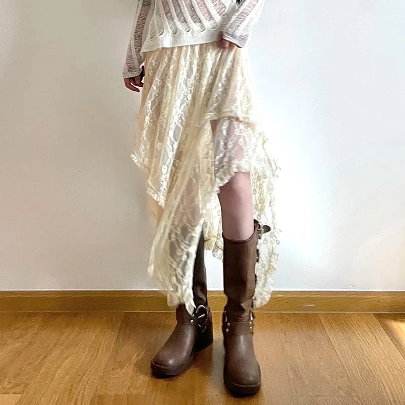 Beige asymmetric lace skirt with leg slit and high-low hem design, side front angle showing silhouette