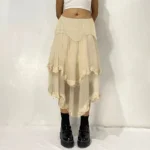 Beige asymmetrical steampunk skirt with tiered lace ruffles and high-low hemline, back straight view on model