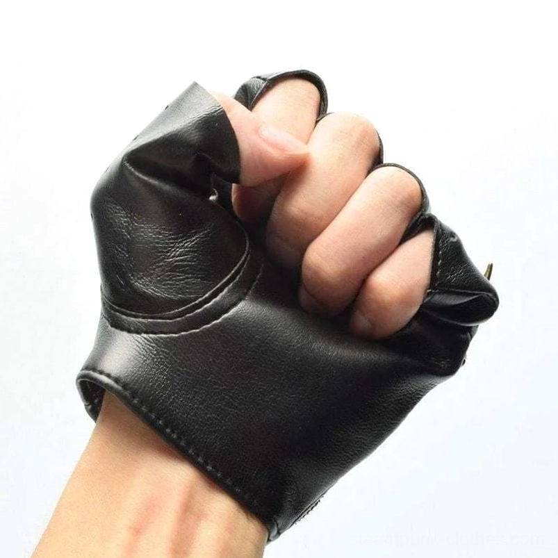 Plain black fingerless biker glove close-up side view showing leather texture and ruffled edges