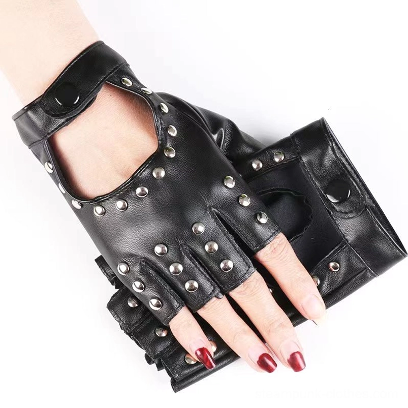 Black fingerless studded leather gloves overhead close-up, female hand with red nails, white background, wrist snap strap detail