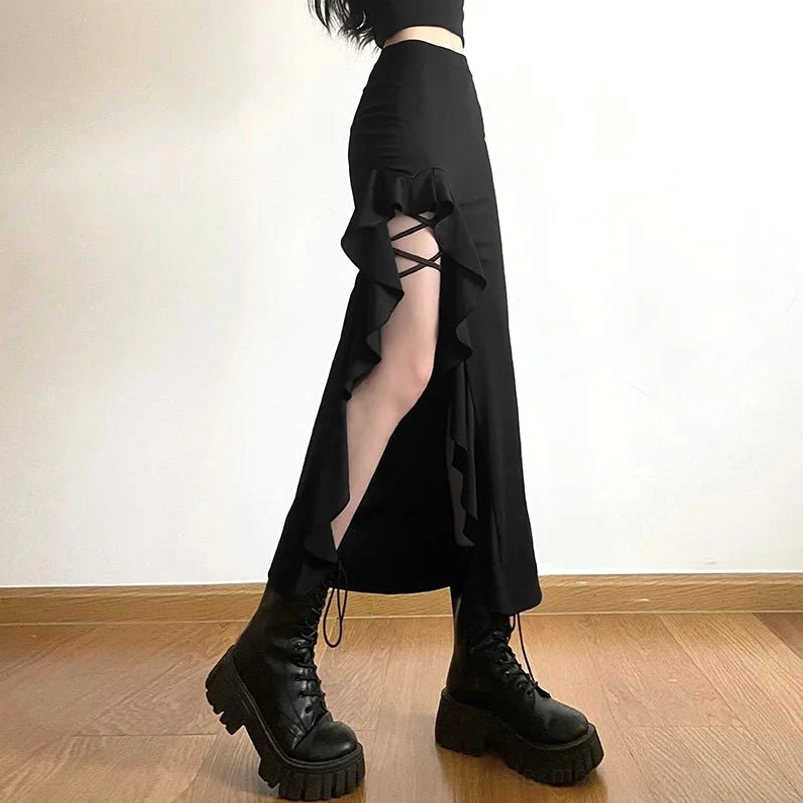 Black gothic slit maxi skirt with crisscross lace detail, ruffled trim, and high-waisted empire design