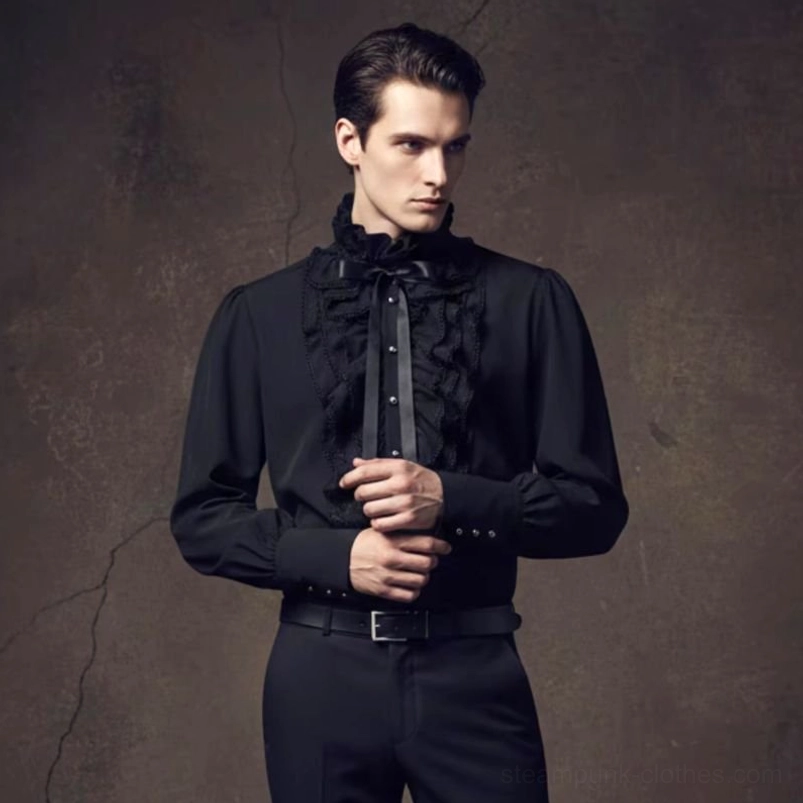 Black gothic vampire shirt with ruffled jabot and satin bow tie, modeled on male fashion model in dark studio setting showcasing steampunk style
