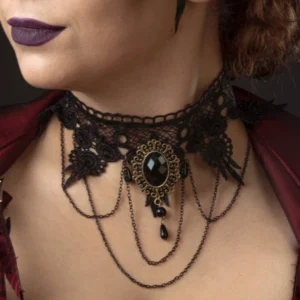 Black lace Gothic steampunk choker necklace with bronze gemstone pendant and tassel chains, close-up neck view