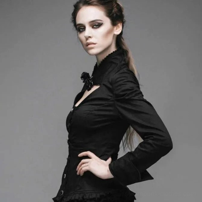 Black steampunk blouse side view, showing fitted waist, puff sleeves, and ornamental neck accessory