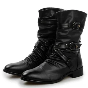 Pair of black steampunk leather boots front three-quarter angle view showcasing dual buckle strap closure and low block heel on white studio background