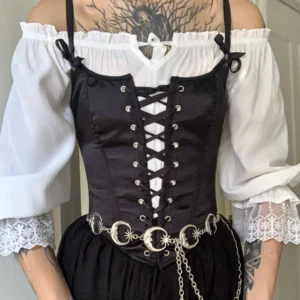 Black overbust steampunk corset with front lace-up design, silver sun and moon chain belt, and ruffled off-shoulder blouse