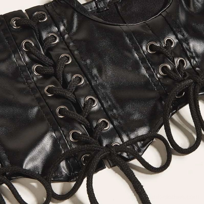 Black faux leather steampunk corset belt flat lay showcasing stitched seams, lace-up grommets, shoulder strap construction, and mechanical design elements
