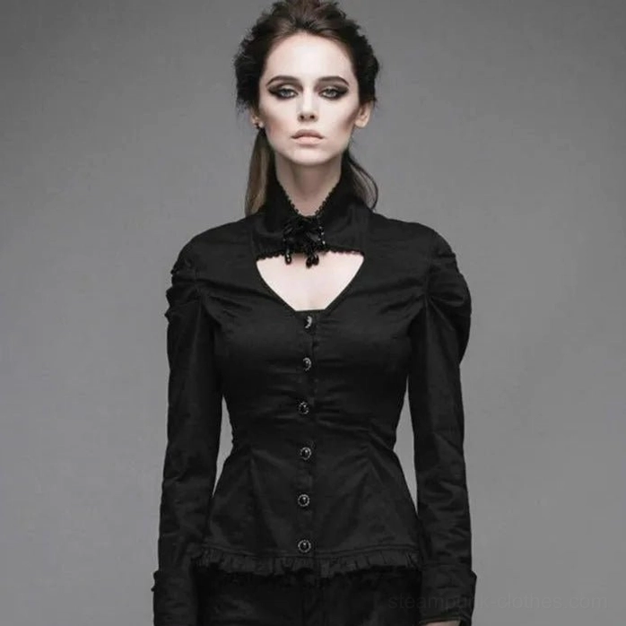 Black steampunk open neck shirt with decorative brooch, front view on female model, featuring ruffled hem and long fitted sleeves