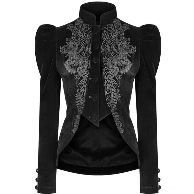 Full front view of black velvet steampunk jacket displaying architectural puffed shoulders, decorative fabric button closure, ornate grey embroidery design, and structured stand-up collar on mannequin