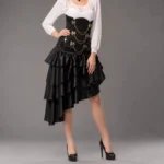 Black tiered ruffle steampunk skirt with high-low asymmetric hem and exposed metal zipper, styled with white blouse and gold chain details
