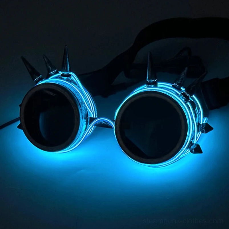 Blue LED steampunk goggles with bright blue glowing EL wire and polished metal spikes on dark blue studio background