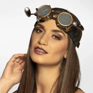 Brass steampunk goggles with dual LED side lamps worn on female model, featuring photochromic mesh lenses and antique copper finish, frontal view