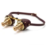 Steampunk brass binocular goggles left three-quarter view with dark brown leather strap and riveted details