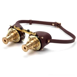 Steampunk brass binocular goggles left three-quarter view with dark brown leather strap and riveted details