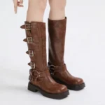 Brown steampunk leather boots with silver buckle hardware, mid-calf height, round toe, displayed on white background