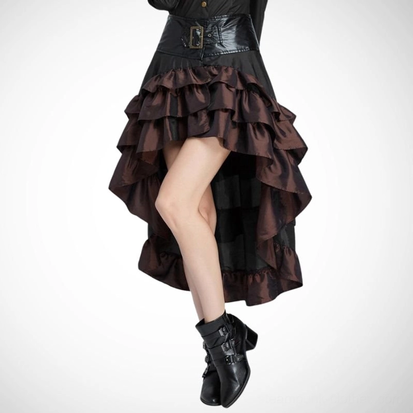 Brown steampunk bustle skirt with tiered ruffles and metal waist belt, low-angle front close-up showcasing black faux leather belt and layered hem details