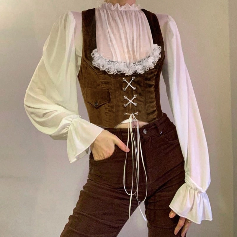 Brown velvet steampunk corset vest with long lace tassels, chest lace trim, and flared puff sleeves, full front view