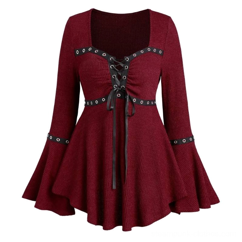Burgundy gothic steampunk lace-up knit top flat lay front view, featuring black satin ribbons, metal eyelet grommets, ruched bust design, and flared bell sleeves on white studio background
