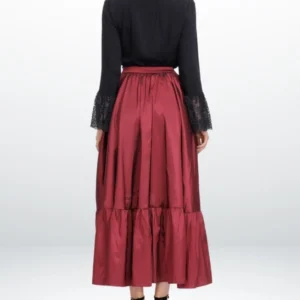 Rear view of burgundy steampunk skirt showing tiered ruffled hem and elastic waistband with fitted silhouette