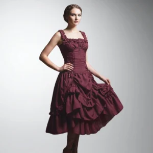 Burgundy Victorian steampunk midi dress with ruffled square neckline, corset bodice, and layered ruffle skirt worn by fashion model in studio