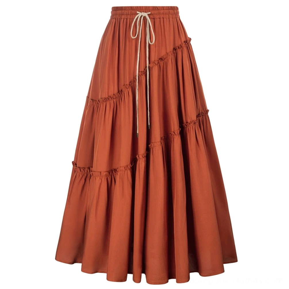 Burnt orange tiered maxi skirt flat lay front view displaying elastic drawstring waist, warm color tone, and detailed multi-layered ruffled construction