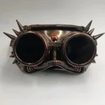 Copper steampunk welder goggles mask with spike detailing and dark tinted lenses, front view on white background
