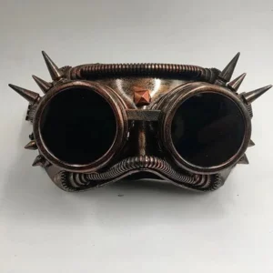 Copper steampunk welder goggles mask with spike detailing and dark tinted lenses, front view on white background