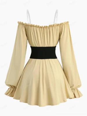 Back view of cream steampunk blouse showing transparent spaghetti straps and black waistband detail