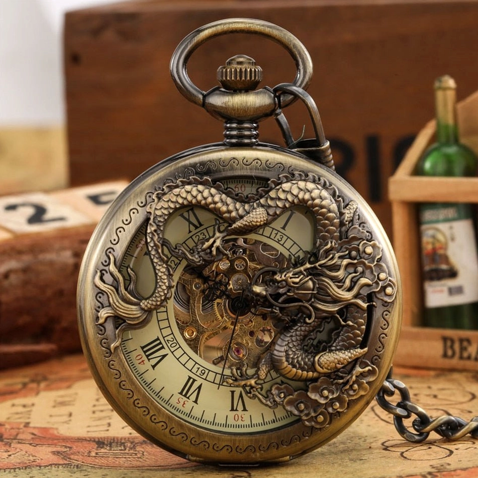 Bronze steampunk dragon pocket watch front view showing carved dragon relief and mechanical skeleton dial with Roman numerals
