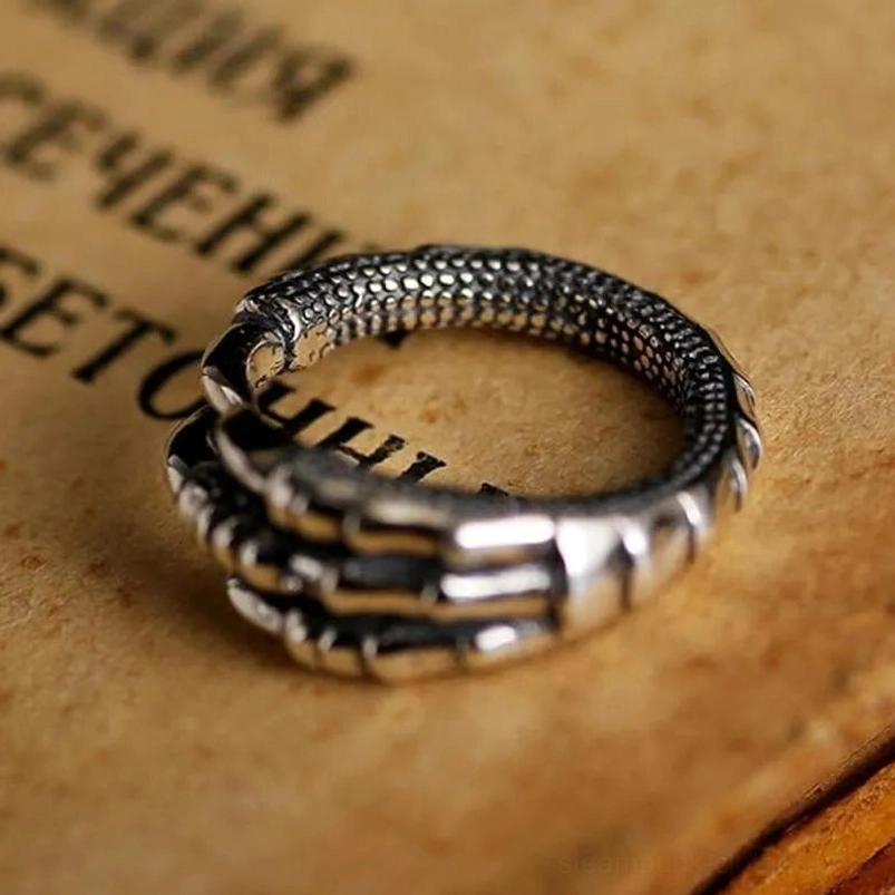 Multi-layered eagle claw steampunk ring top view with polished oxidized silver finish