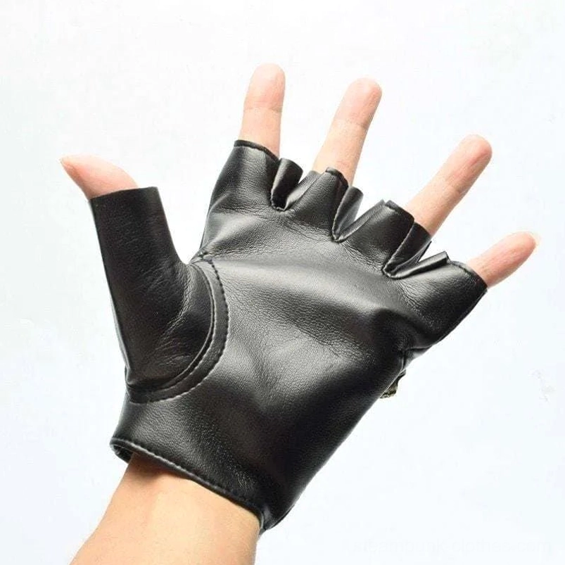 Steampunk fingerless motorcycle glove on human hand showing smooth black leather and cutout design