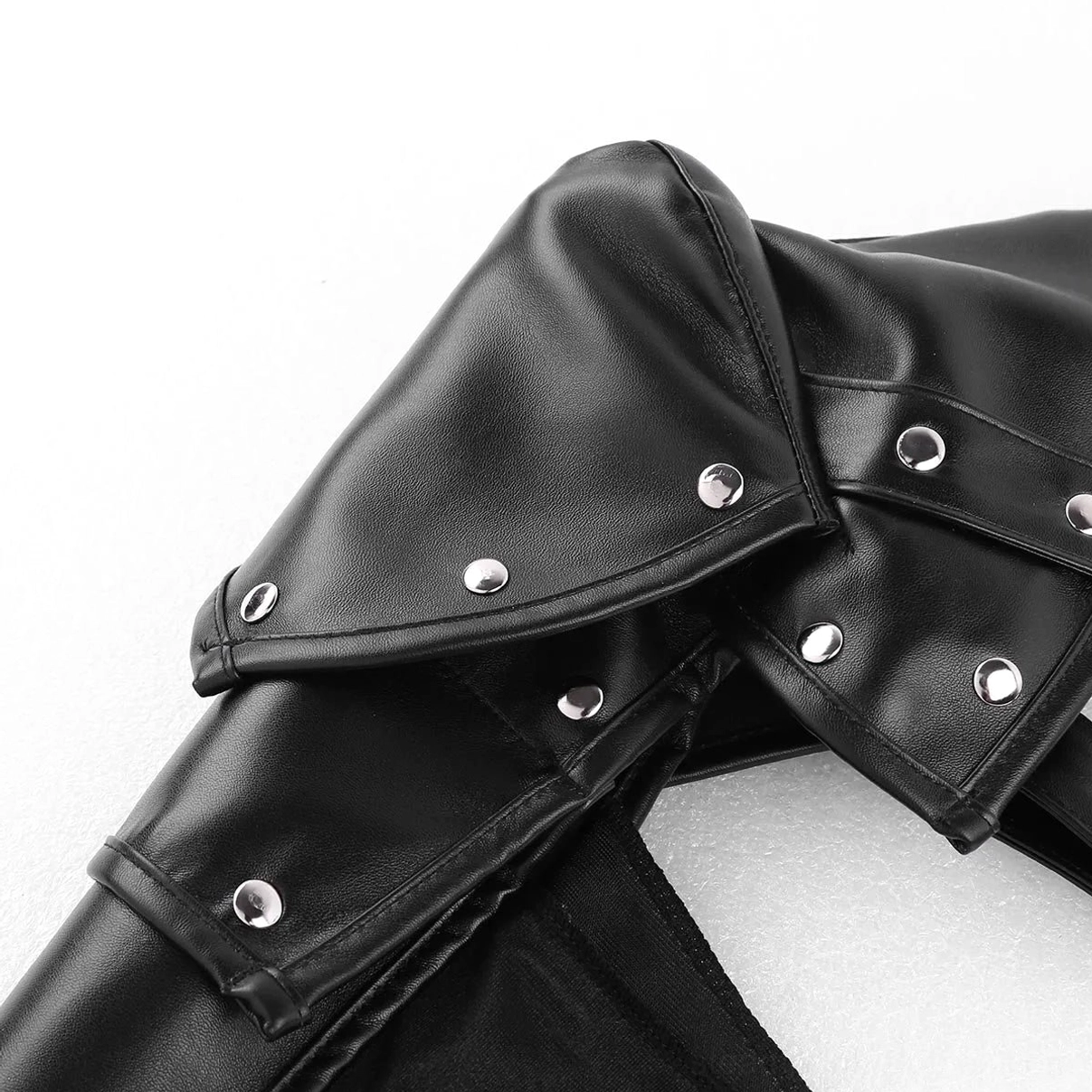Shoulder armor detail showing authentic silver metal rivets, professionally stitched leather edges, and industrial craftsmanship quality of gothic steampunk arm guard