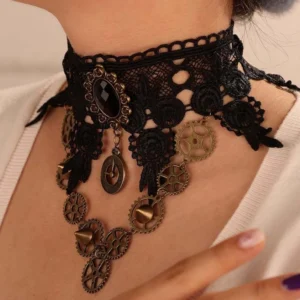 Steampunk choker featuring black crochet lace and dark bronze metal charms with oval black gemstone, displaying side angle detail of intricate craftsmanship
