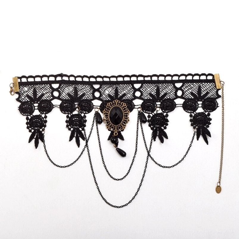 Flat lay overhead view of complete black lace gothic steampunk choker necklace with full adjustable chain length