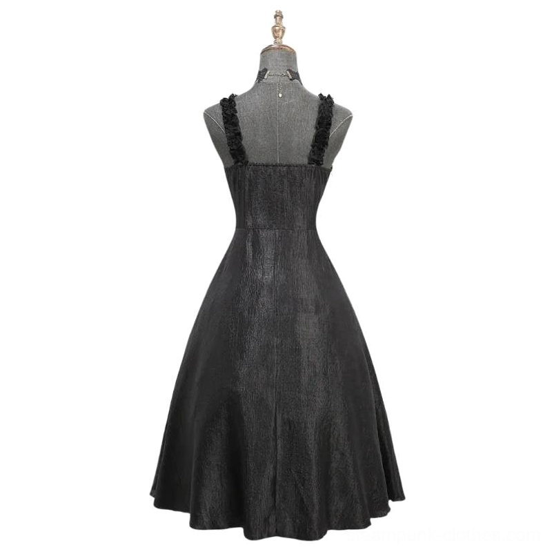 Black gothic steampunk dress back view showing fitted waist, A-line skirt drape, and delicate spaghetti strap design on dress form