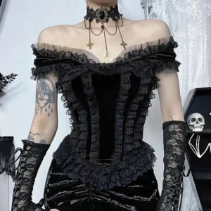 Close-up detail of black velvet fabric and intricate lace embellishments on gothic corset bustier top