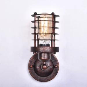 Industrial wall sconce front view featuring aged copper texture, round wall mount base, and built-in switch mechanism