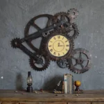 Large steampunk gear wall clock with distressed dark metal frame and cream Roman numeral dial displayed in industrial home setting