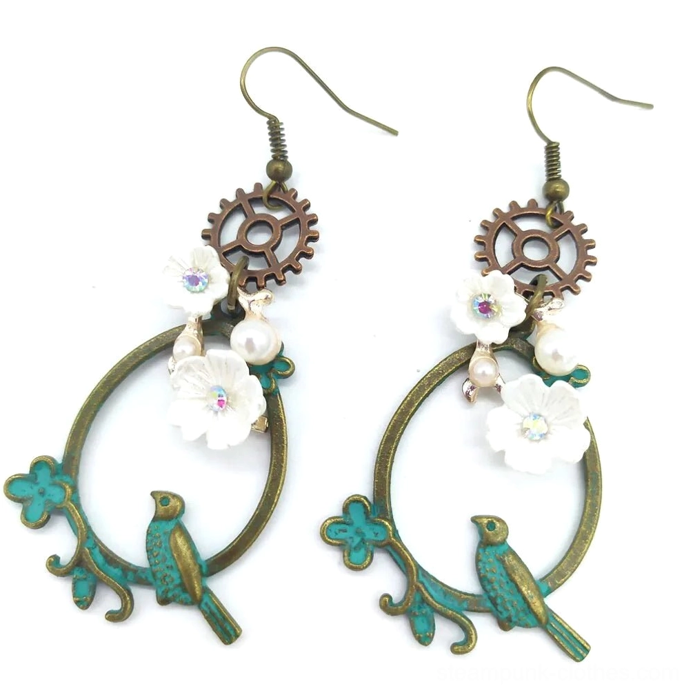 Large steampunk flower bird loop earrings with verdigris bronze frame, prominent gear detailing, oversized white flowers, pearl accents, and decorative bird charm