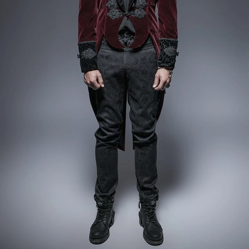 Men's Victorian steampunk trousers front view on model, black jacquard damask pattern, high-waisted tailored fit with formal gothic styling