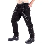 Military steampunk cargo pants front three-quarter view featuring black canvas, metal chains, silver zippers, and grommet details on male model