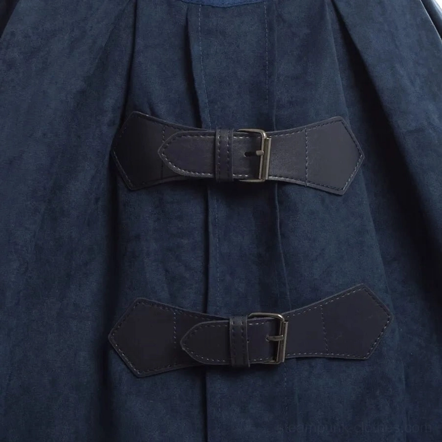 Close-up detail of navy steampunk dress featuring black leather buckles and navy suede fabric, highlighting quality craftsmanship and industrial design elements
