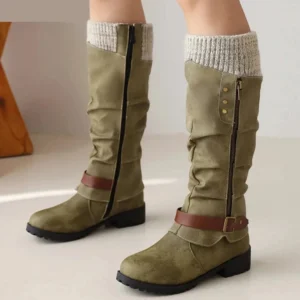 Olive green suede steampunk mid-calf boots with gray ribbed knit collar, brown leather buckle strap, and side metal zipper—front three-quarter view showing authentic Victorian-industrial design details