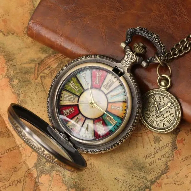 Open steampunk pocket watch revealing hinged metal cover and colorful sector dial with Roman numerals, displayed on retro map and leather notebook