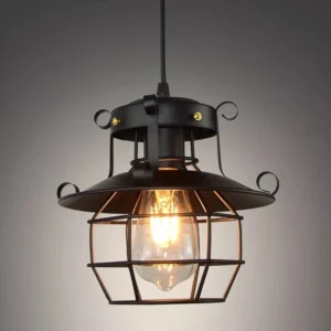 Oxford steampunk industrial pendant lamp with matte black wrought iron frame and intricate scroll accents on wire cage shade, front close-up studio view