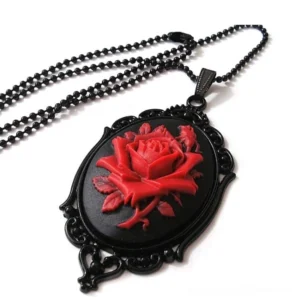 Red rose cameo steampunk necklace featuring deep crimson carved rose on black base with decorative black filigree frame and ball chain