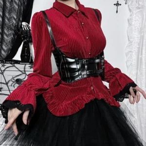 Red velvet steampunk shirt front view on model with black leather corset and lace trim cuffs, gothic home setting