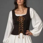 Reversible steampunk corset vest for women featuring adjustable braided lace-up front closure, square neckline, and dual-tone brown suede construction worn by model